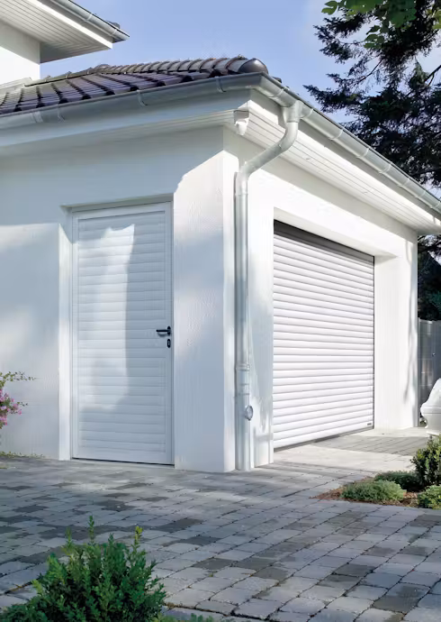 Garage roller door with matching side door